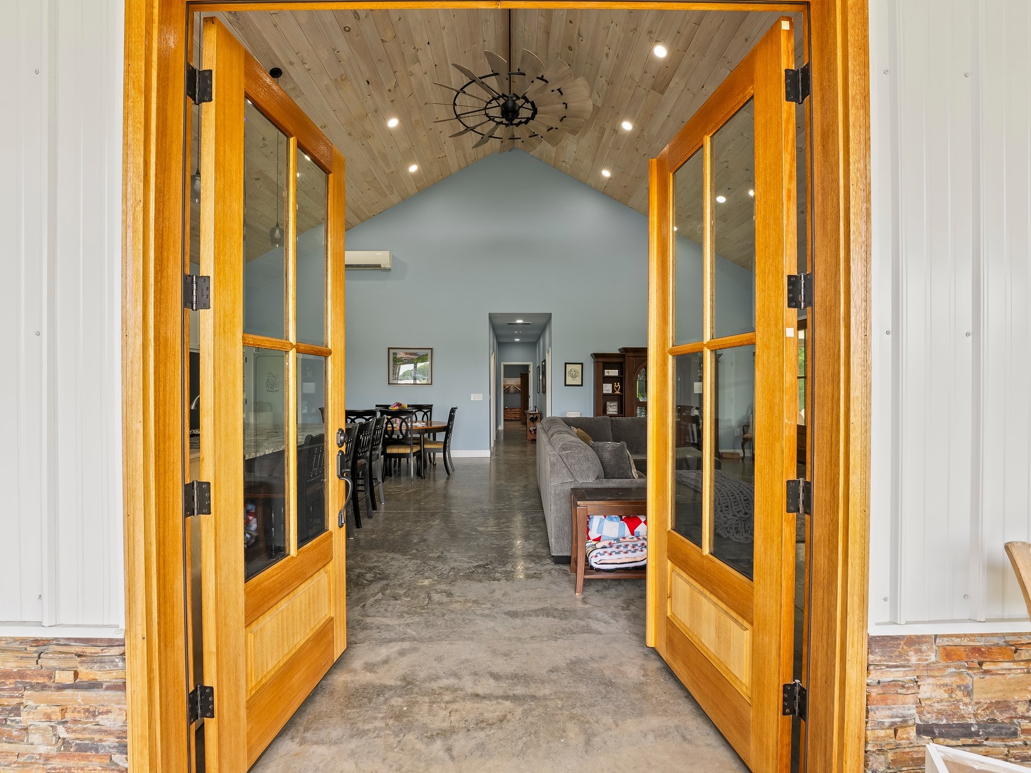 757 Thompson Creek Road Wartrace, TN 37183 - Photo 14 of 42 a view of a hallway with dining area and chandelier