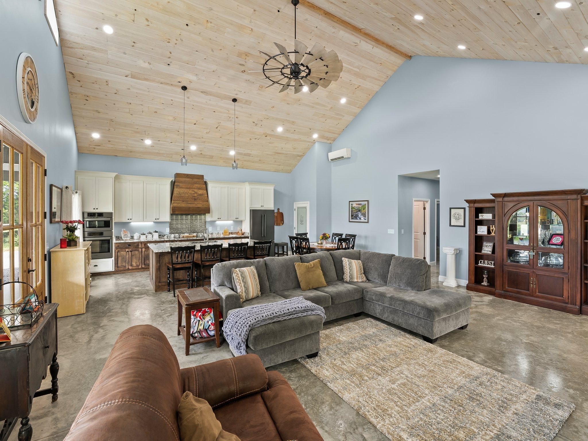 757 Thompson Creek Road Wartrace, TN 37183 - Photo 15 of 42 a living room with furniture kitchen view and a chandelier