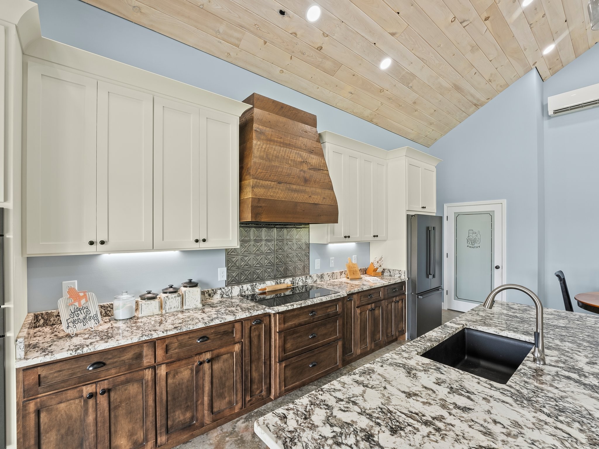 757 Thompson Creek Road Wartrace, TN 37183 - Photo 20 of 42 a kitchen with granite countertop a sink stainless steel appliances and cabinets