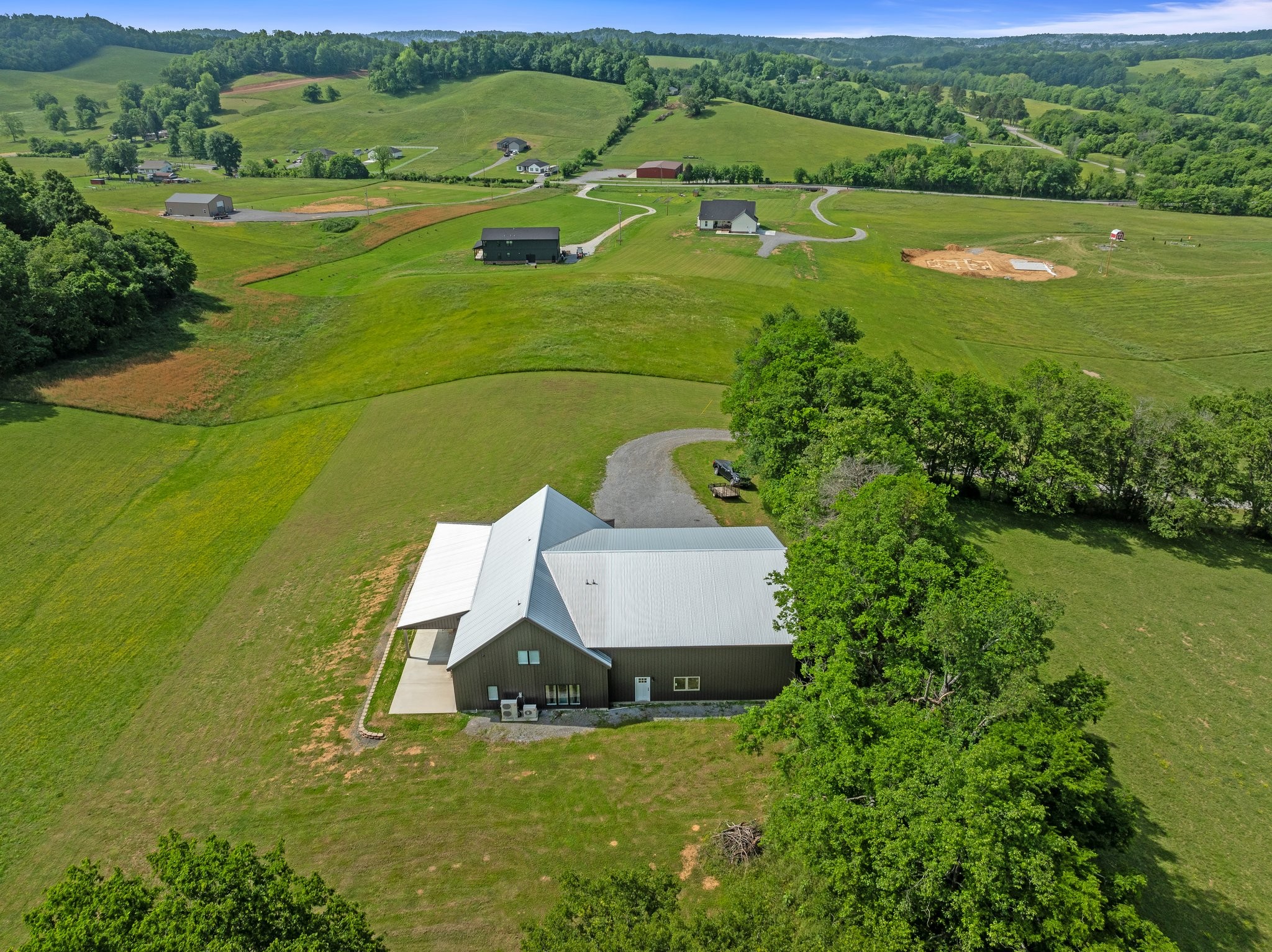 757 Thompson Creek Road Wartrace, TN 37183 - Photo 2 of 42 an aerial view of a house with a yard
