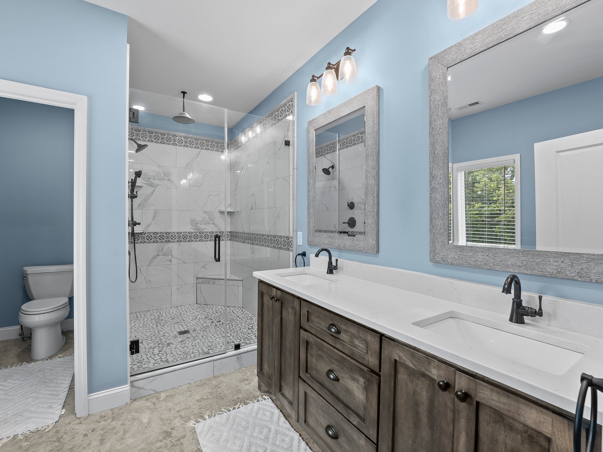 757 Thompson Creek Road Wartrace, TN 37183 - Photo 28 of 42 a bathroom with a shower sink and mirror