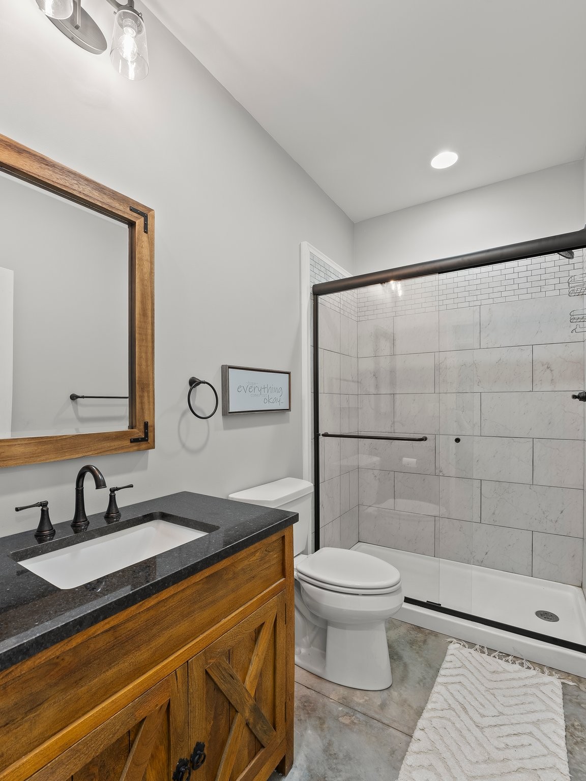 757 Thompson Creek Road Wartrace, TN 37183 - Photo 32 of 42 a bathroom with a sink a toilet and shower