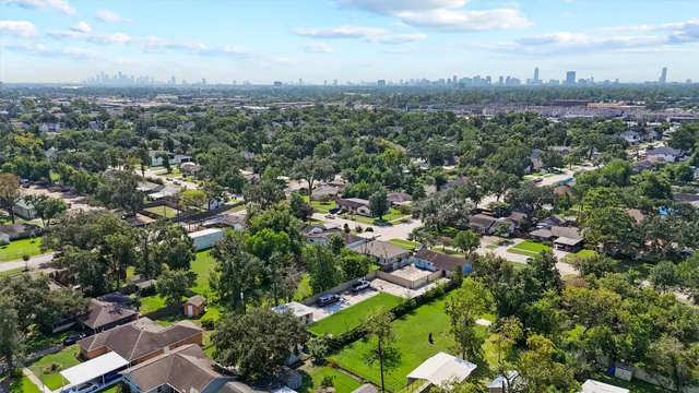 an aerial view of a city with lots of residential buildings