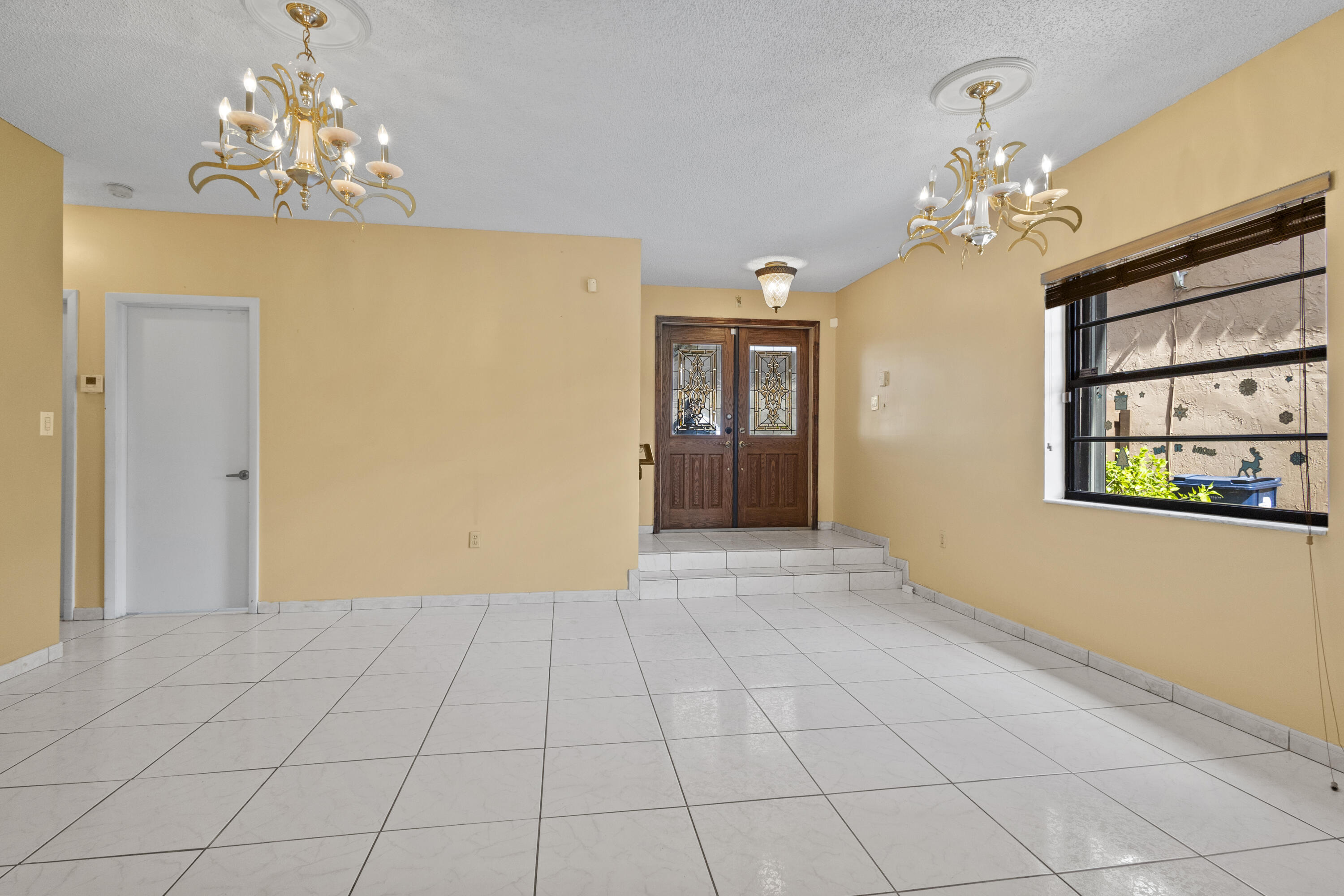 13528 Southwest 9th Lane Miami, FL 33184 - Photo 16 of 24 a view of a chandelier in a room