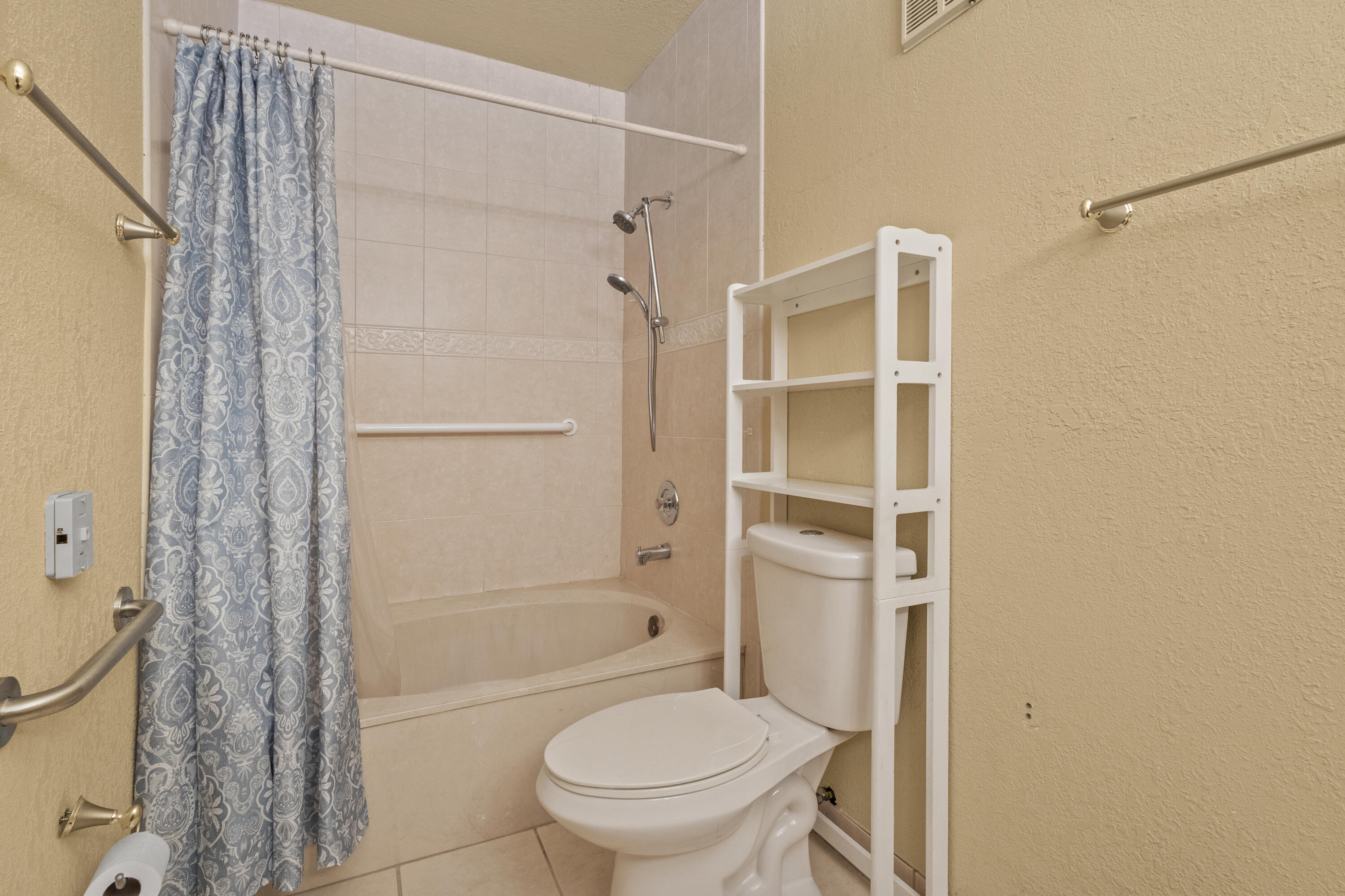 13528 Southwest 9th Lane Miami, FL 33184 - Photo 9 of 24 a bathroom with a shower and a toilet