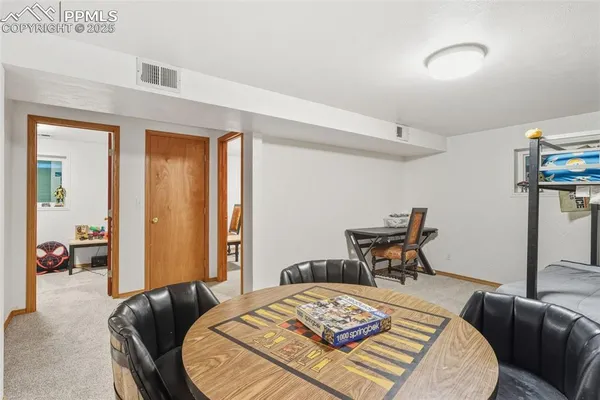 a view of a livingroom with furniture