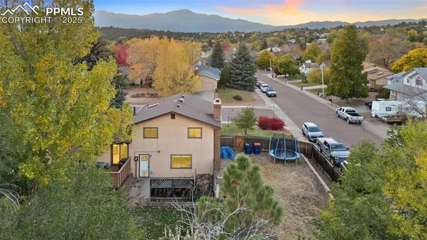 a aerial view of a house with a lake view