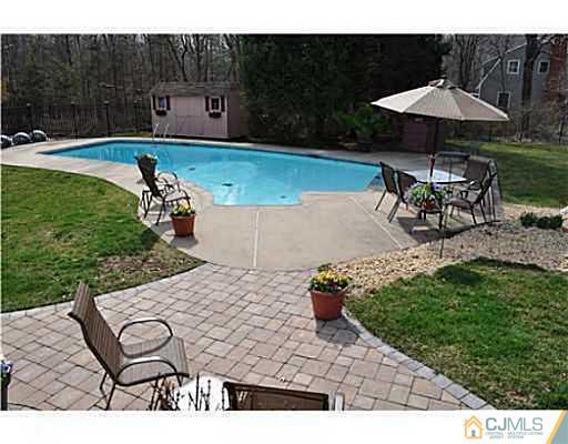 152 Mountainview Road Warren, NJ 07059 - Photo 3 of 10 a view of a backyard with sitting area