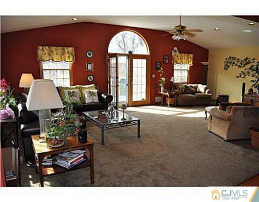 152 Mountainview Road Warren, NJ 07059 - Photo 6 of 10 a living room with furniture and a large window