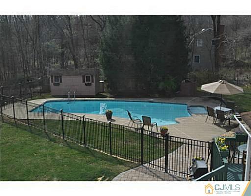 152 Mountainview Road Warren, NJ 07059 - Photo 10 of 10 a view of a backyard and table