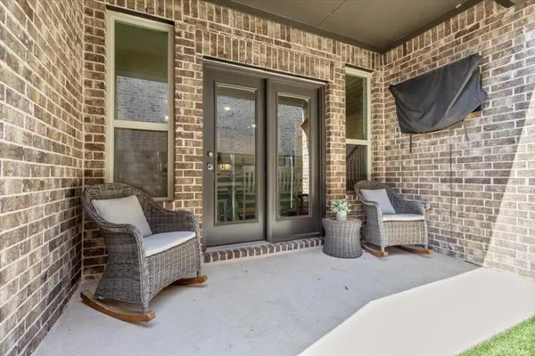 a building outdoor space with patio furniture