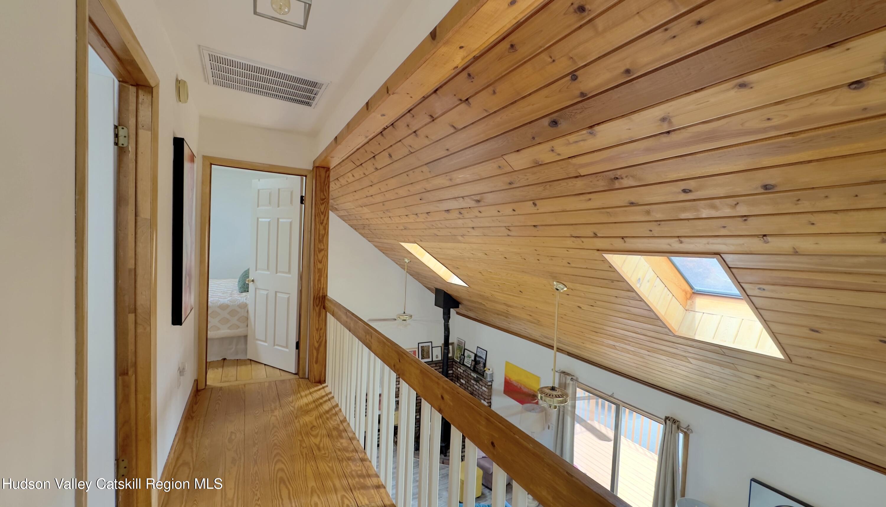 1542 Sleepy Hollow Road Athens, NY 12015 - Photo 13 of 27 a view of staircase with wooden floor and stairs