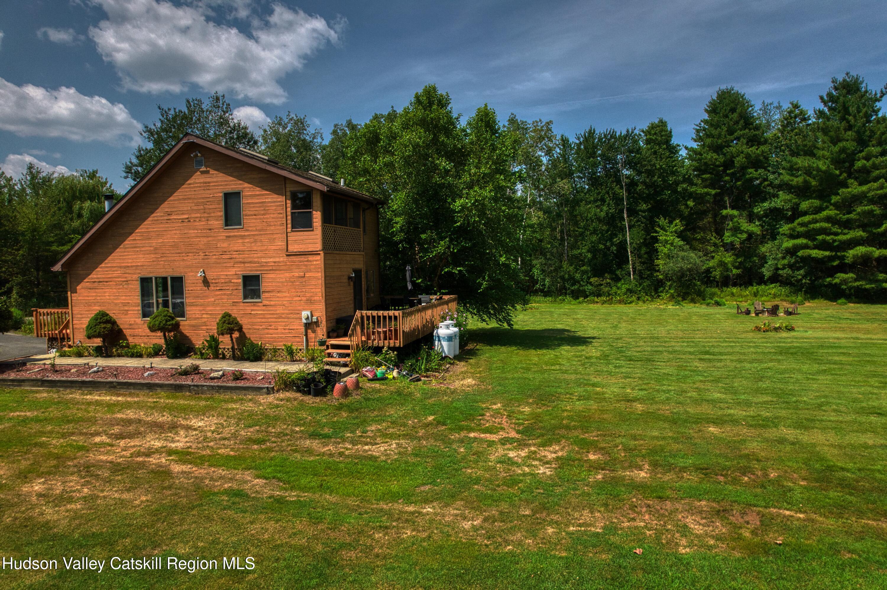 1542 Sleepy Hollow Road Athens, NY 12015 - Photo 19 of 27 a view of a house with a yard