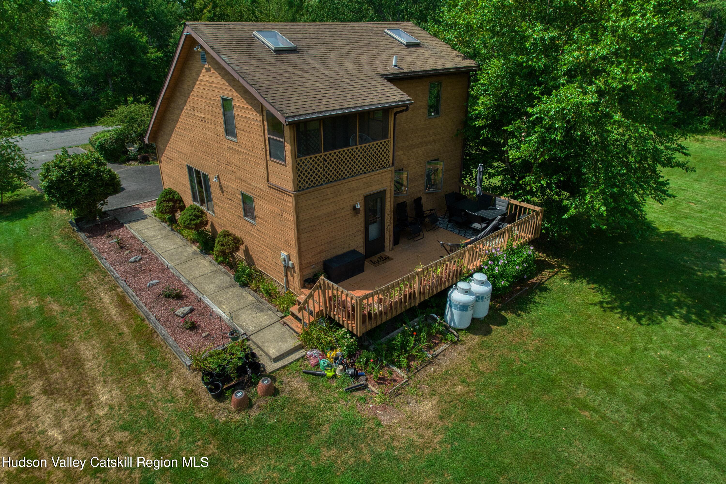 1542 Sleepy Hollow Road Athens, NY 12015 - Photo 20 of 27 an aerial view of a house with a yard