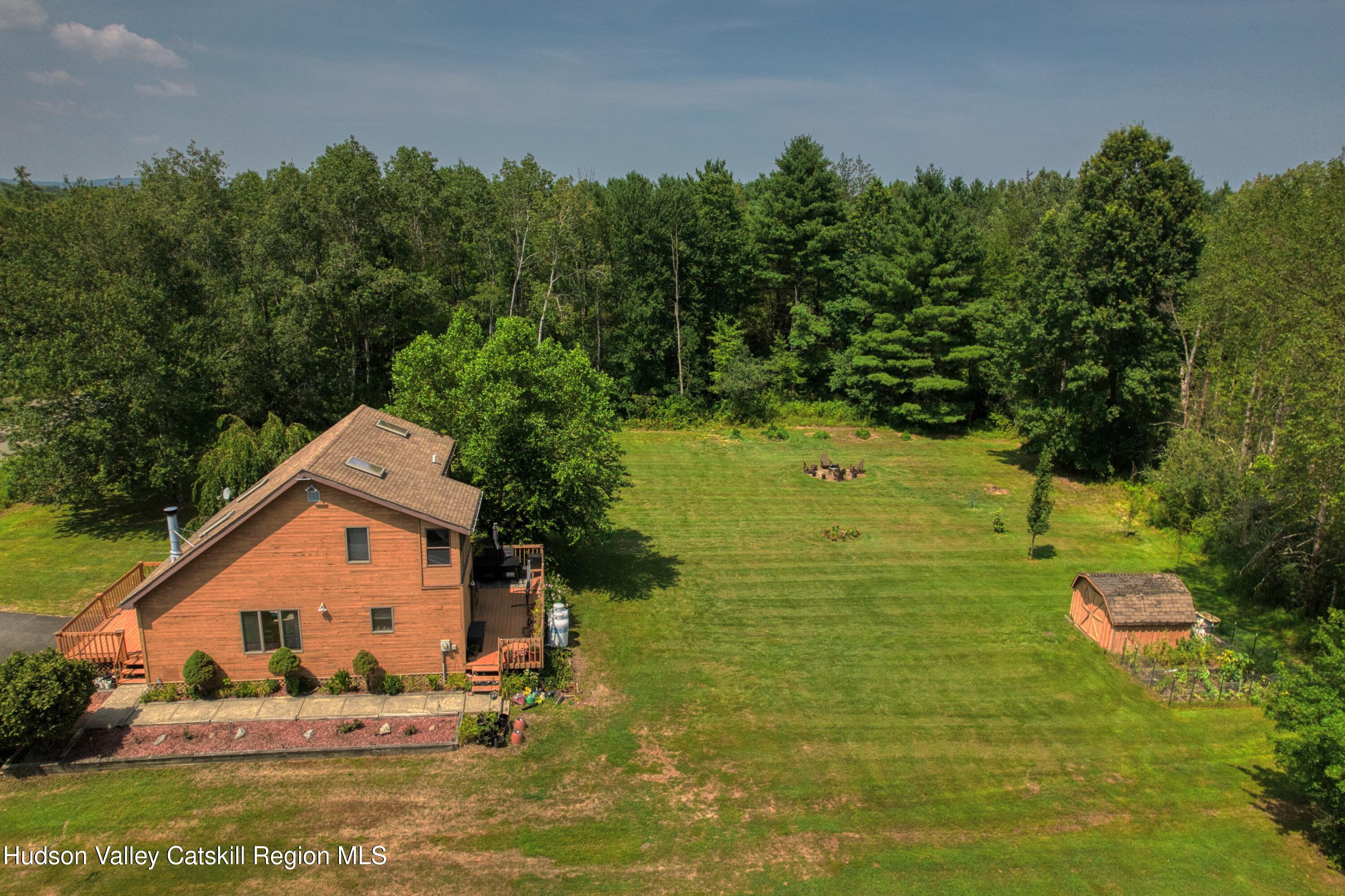 1542 Sleepy Hollow Road Athens, NY 12015 - Photo 23 of 27 a front view of a house with a yard