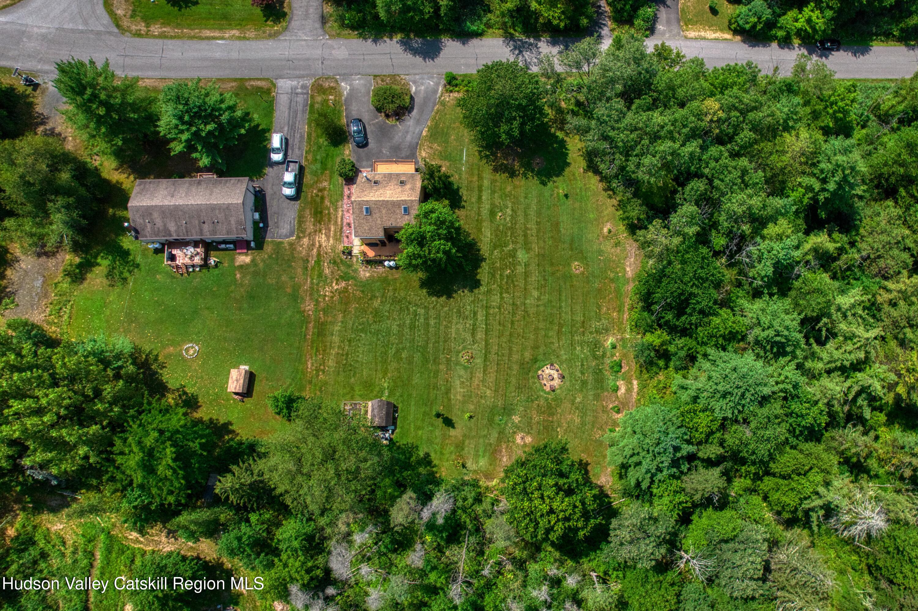 1542 Sleepy Hollow Road Athens, NY 12015 - Photo 25 of 27 an aerial view of a house with a yard swimming pool and outdoor seating