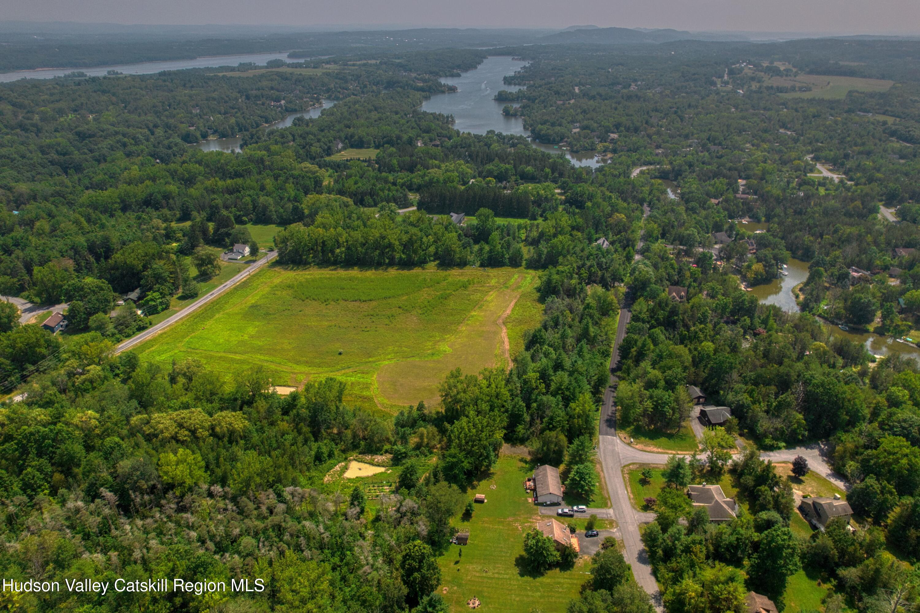 1542 Sleepy Hollow Road Athens, NY 12015 - Photo 27 of 27 an aerial view of residential houses with outdoor space and trees
