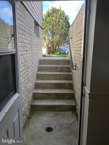 a view of entryway with a front door