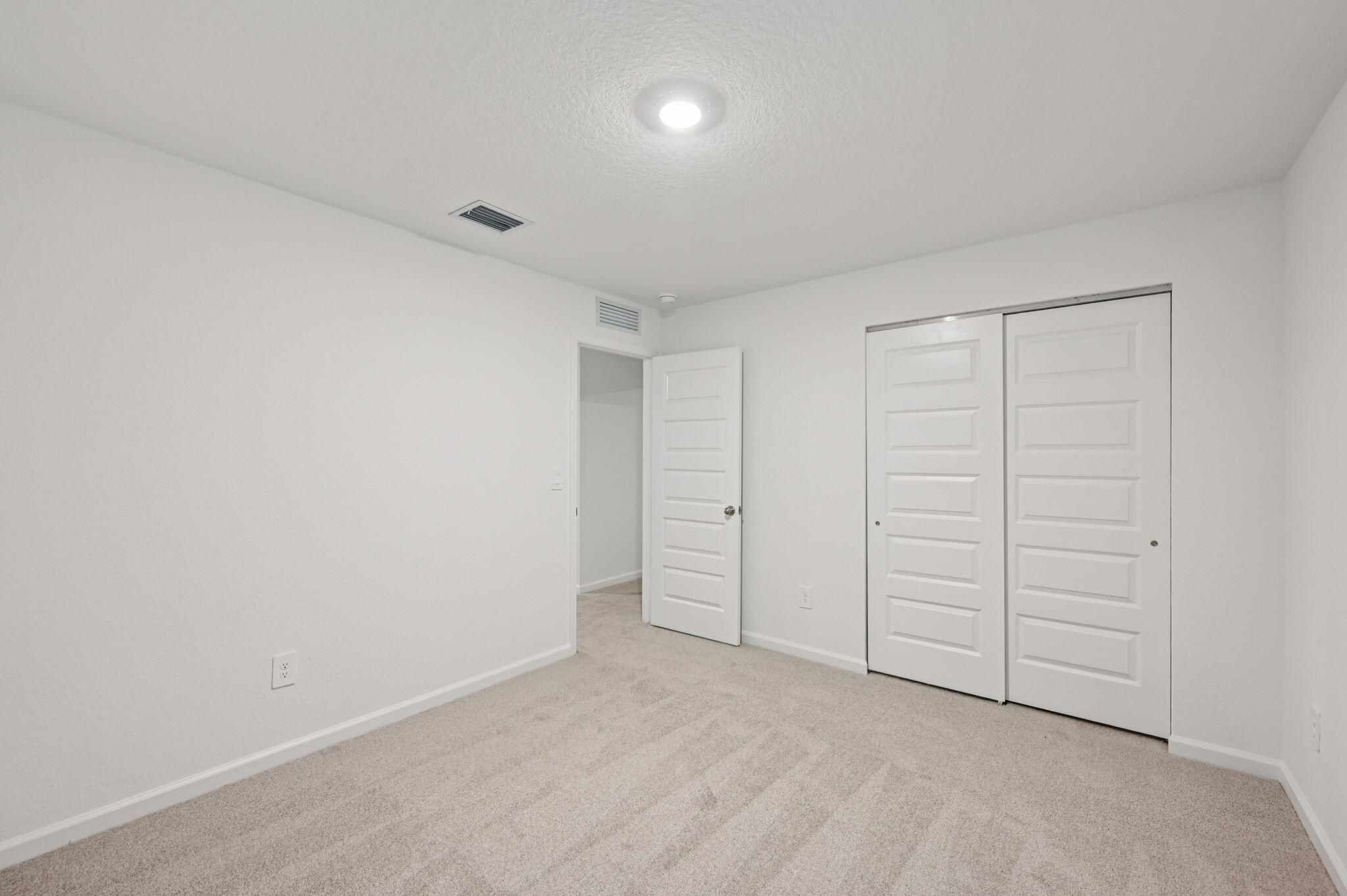 14202 Southwest New Dawn Road Indiantown, FL 34956 - Photo 16 of 27 a view of an empty room