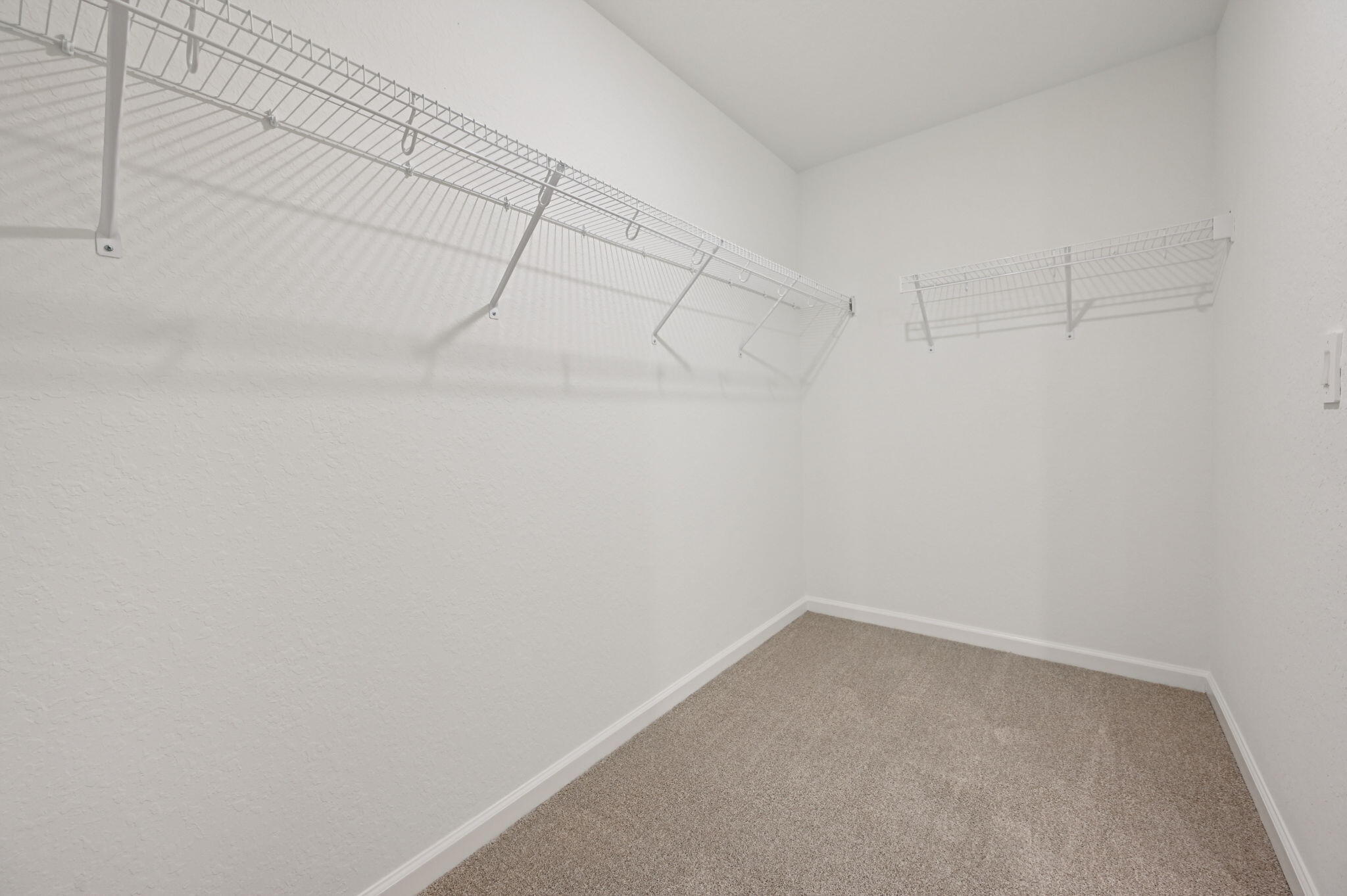 14202 Southwest New Dawn Road Indiantown, FL 34956 - Photo 19 of 27 a view of a room with racks on the wall