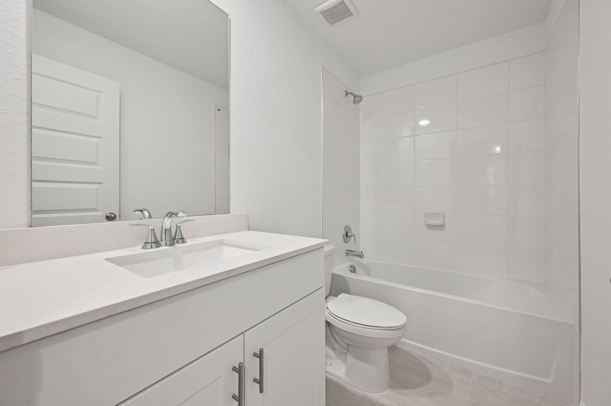 14202 Southwest New Dawn Road Indiantown, FL 34956 - Photo 21 of 27 a bathroom with a sink a toilet and shower