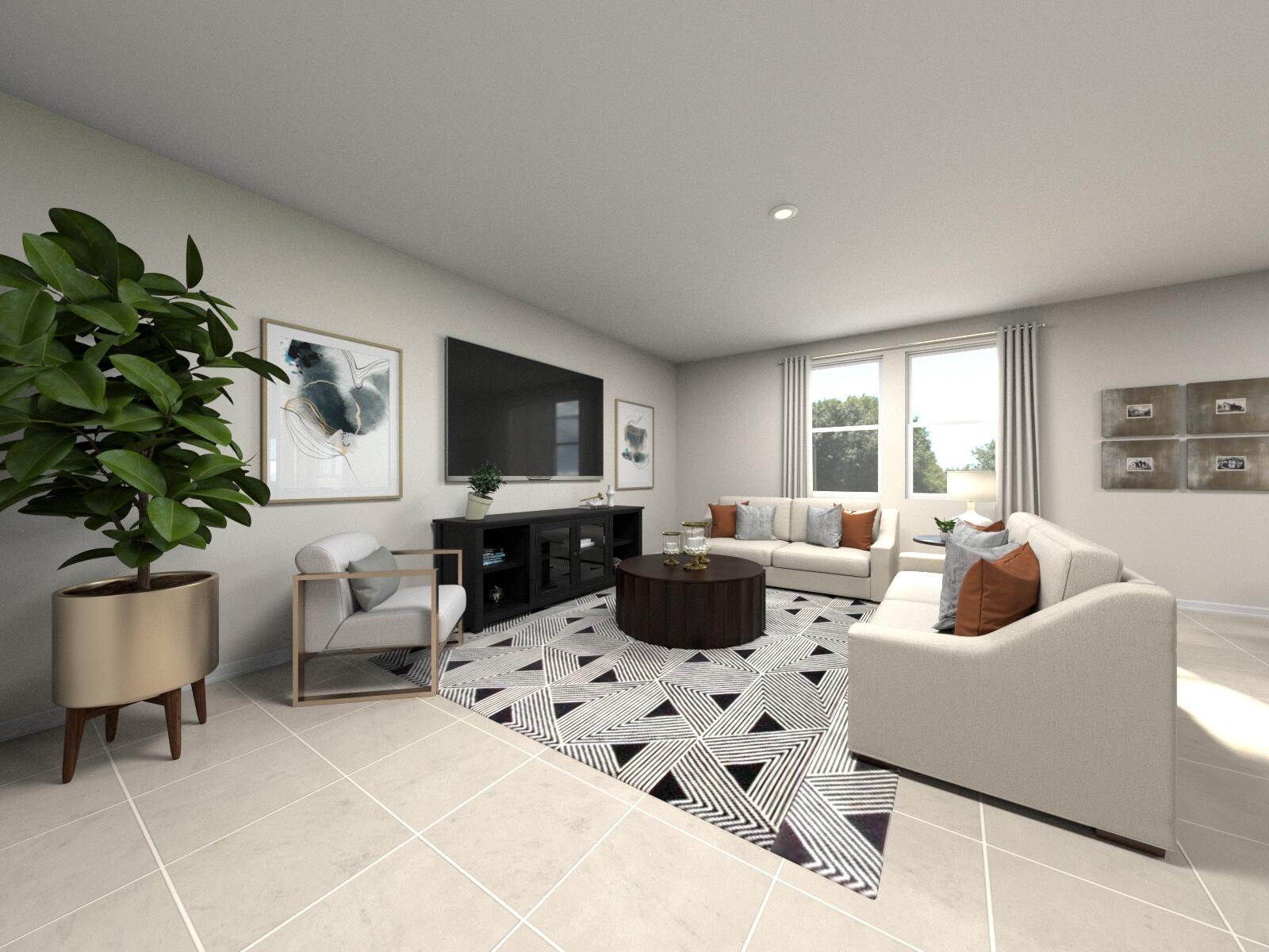 14202 Southwest New Dawn Road Indiantown, FL 34956 - Photo 6 of 27 a living room with furniture and a flat screen tv