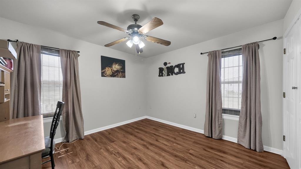 11500 Bowden Road Lipan, TX 76462 - Photo 26 of 32 wooden floor in an empty room with a window