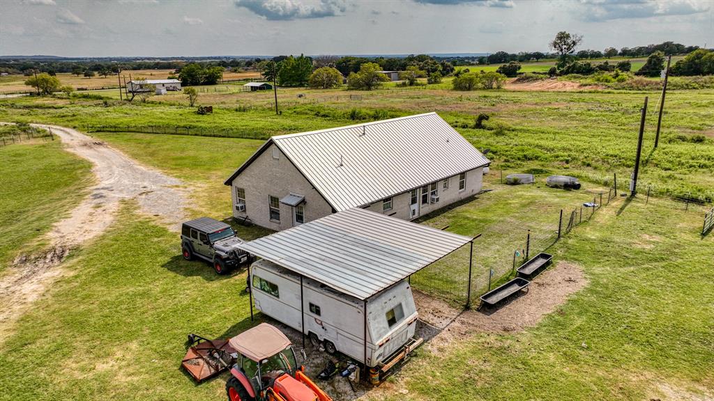 11500 Bowden Road Lipan, TX 76462 - Photo 28 of 32 an aerial view of a house with outdoor space