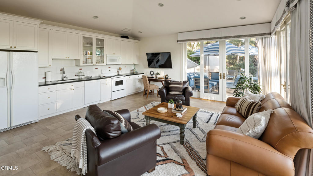 1460 Virginia Road San Marino, CA 91108 - Photo 18 of 27 a living room with furniture and a flat screen tv