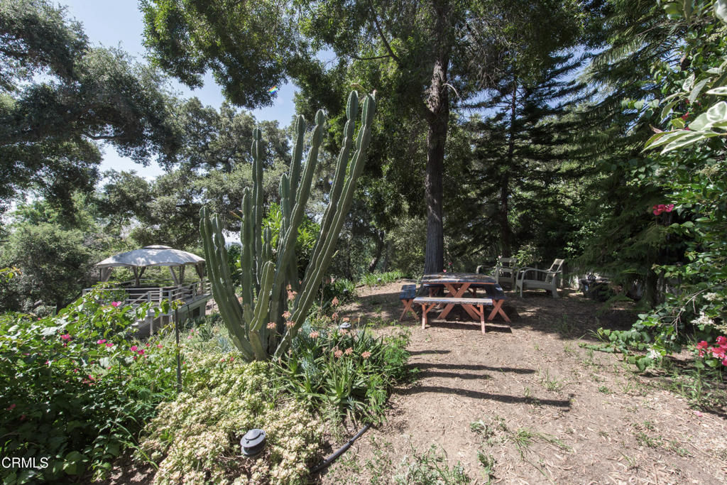 1460 Virginia Road San Marino, CA 91108 - Photo 21 of 27 a view of a bench in a backyard