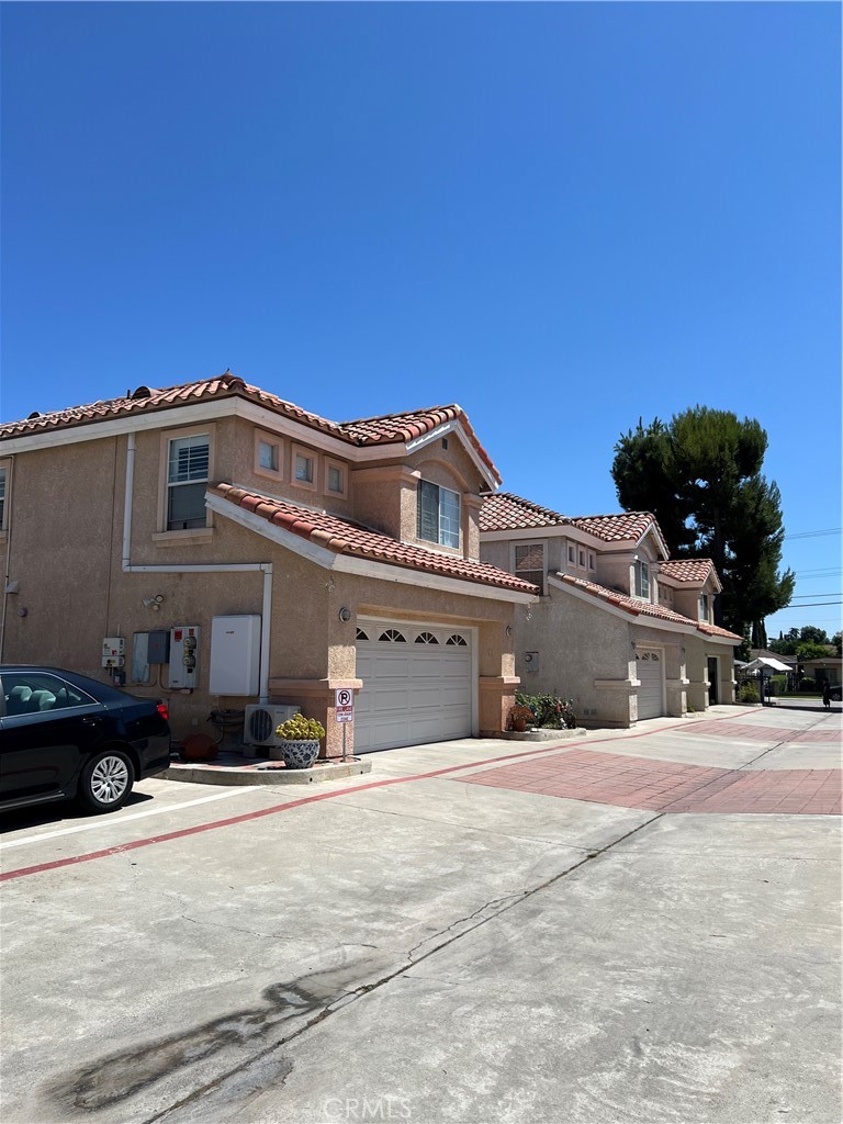 12143 Ferris Road El Monte, CA 91732 - Photo 11 of 18 a front view of a house with a yard