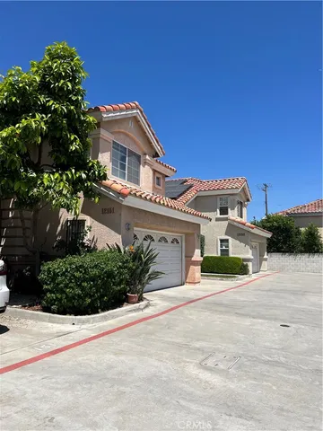 a front view of a house with a garage