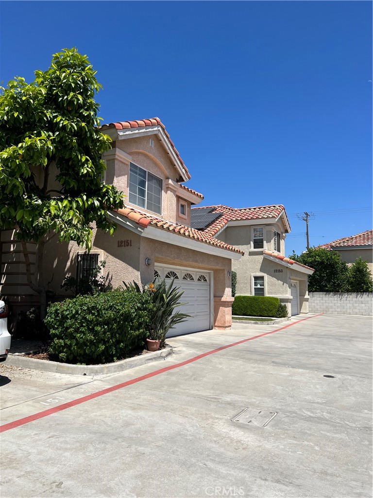 12143 Ferris Road El Monte, CA 91732 - Photo 13 of 18 front view of a house with a street
