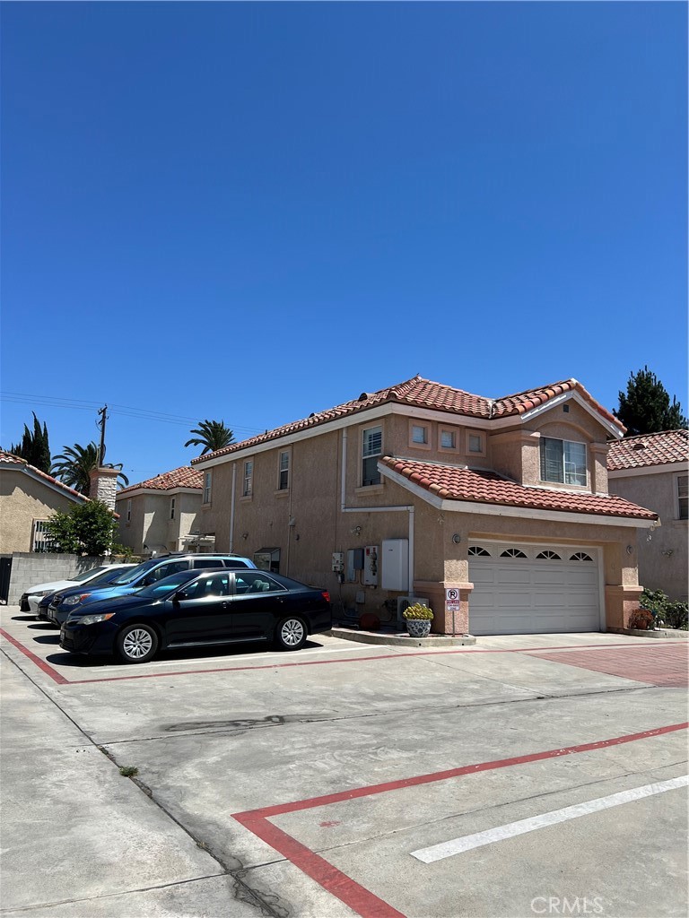 12143 Ferris Road El Monte, CA 91732 - Photo 14 of 18 a front view of a house with a garage