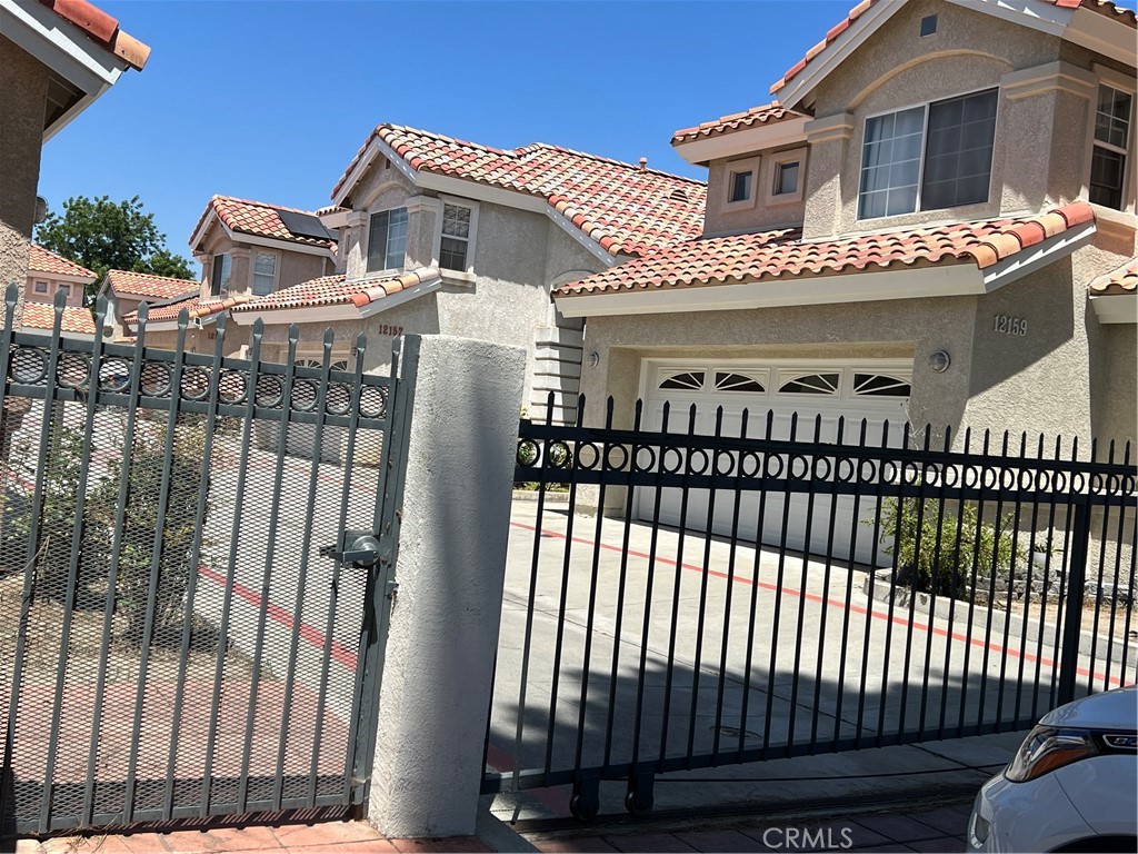 12143 Ferris Road El Monte, CA 91732 - Photo 17 of 18 a front view of a house