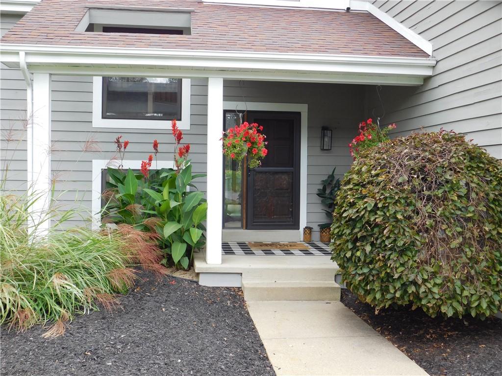 195 Finnin Road Lower Burrell, PA 15068 - Photo 2 of 21 a front view of a house with a lots of flowers