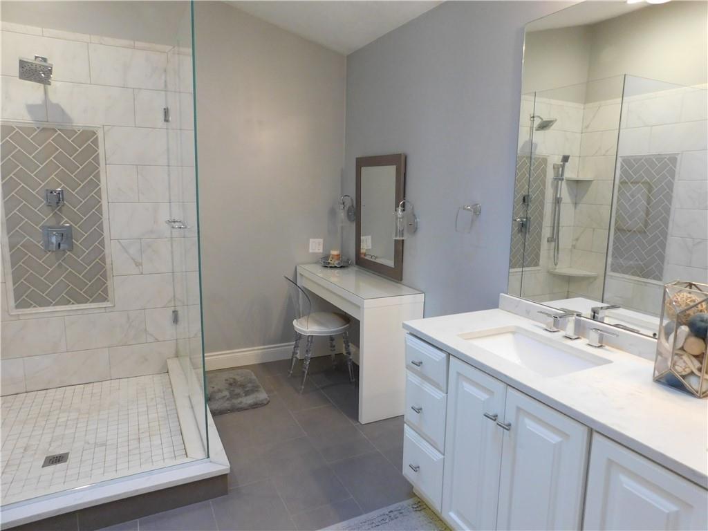 195 Finnin Road Lower Burrell, PA 15068 - Photo 13 of 21 a bathroom with a sink and a mirror