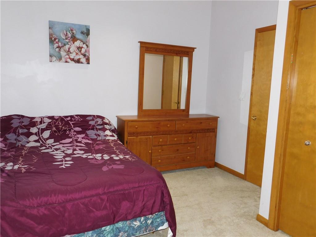 195 Finnin Road Lower Burrell, PA 15068 - Photo 14 of 21 a bedroom with a bed and painting on the wall