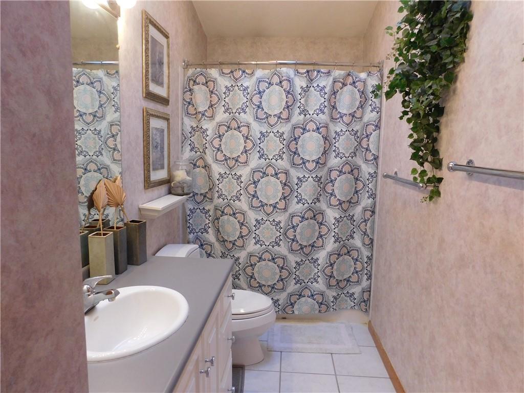 195 Finnin Road Lower Burrell, PA 15068 - Photo 15 of 21 a bathroom with a sink toilet and shower