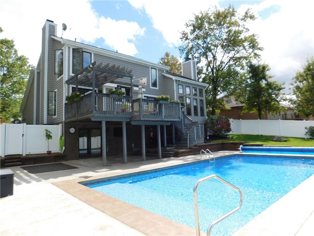 195 Finnin Road Lower Burrell, PA 15068 - Photo 20 of 21 a view of a house with swimming pool and sitting area
