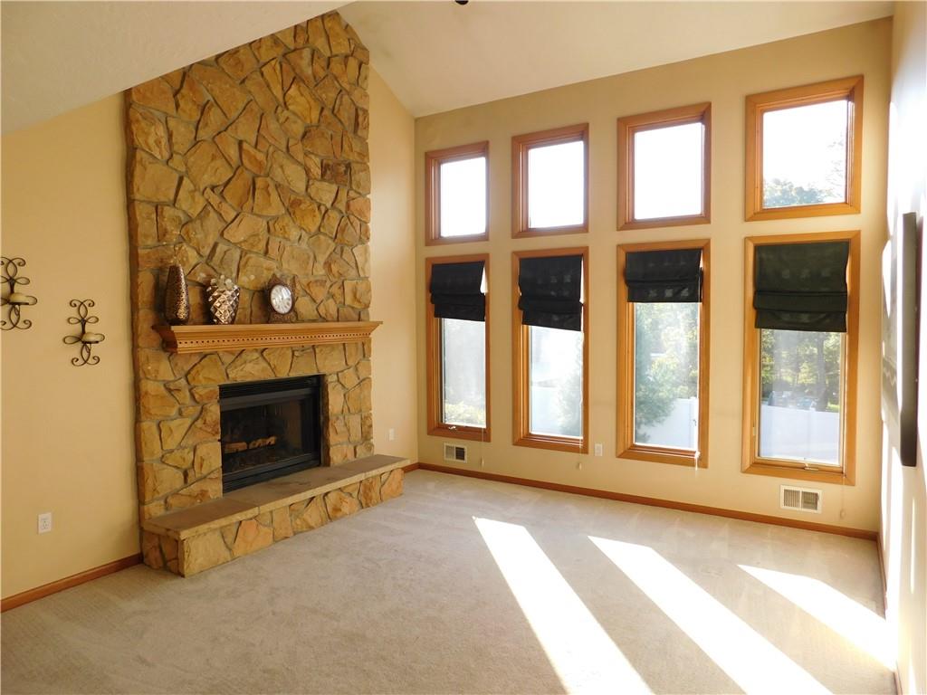 195 Finnin Road Lower Burrell, PA 15068 - Photo 4 of 21 a view of an empty room with a fireplace