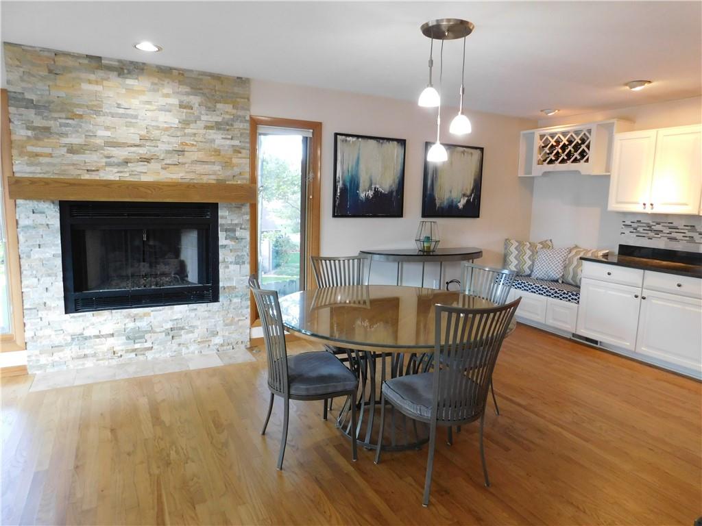 195 Finnin Road Lower Burrell, PA 15068 - Photo 7 of 21 a dining room with a table chairs and a kitchen view