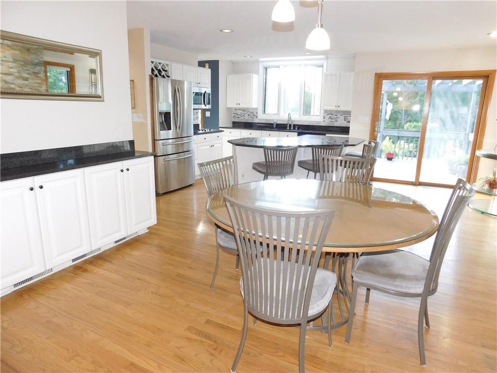 195 Finnin Road Lower Burrell, PA 15068 - Photo 8 of 21 a dining room with furniture and wooden floor