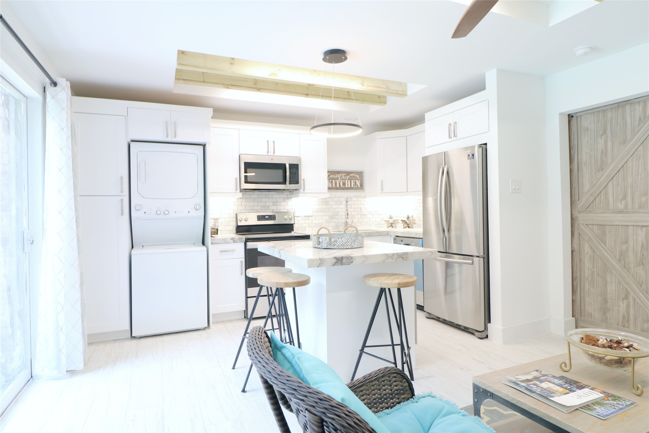412 Pacific Street, Unit 2G Houston, TX 77006 - Photo 12 of 14 a kitchen with stainless steel appliances a refrigerator and a stove top oven