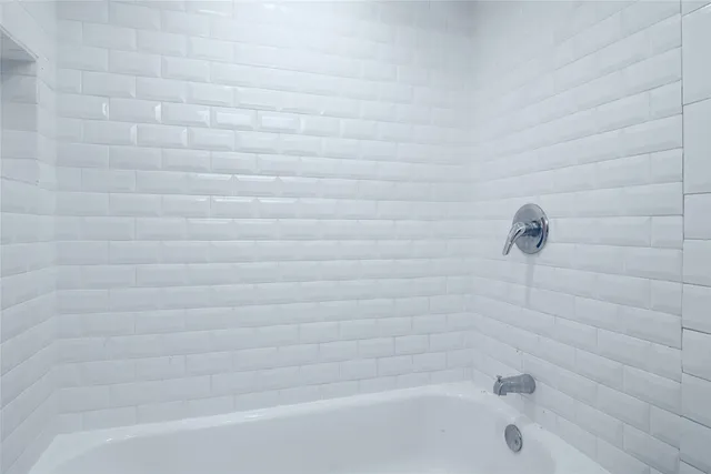 a close up of a bathtub