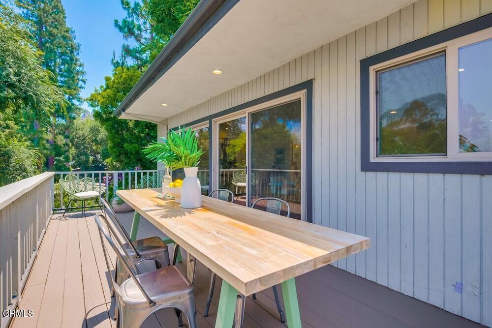 6287 Pine Crest Drive Los Angeles, CA 90042 - Photo 24 of 64 a view of a patio with a table and chairs