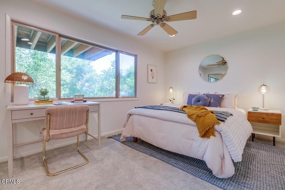 6287 Pine Crest Drive Los Angeles, CA 90042 - Photo 35 of 64 a bedroom with a bed and a table