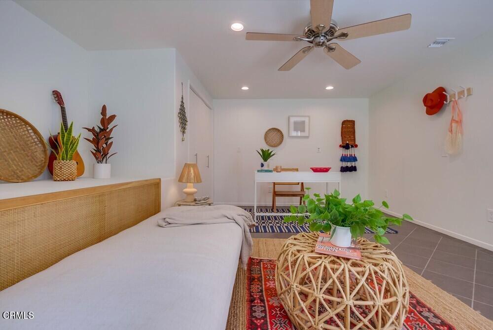 6287 Pine Crest Drive Los Angeles, CA 90042 - Photo 53 of 64 a bedroom with a bed and a chandelier