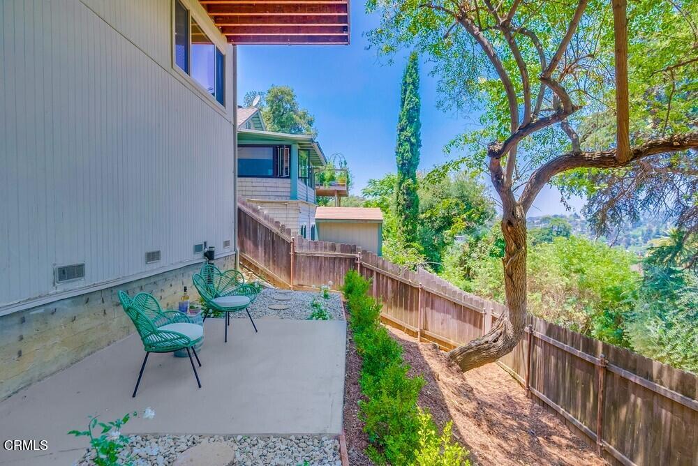 6287 Pine Crest Drive Los Angeles, CA 90042 - Photo 56 of 64 a view of a chair and table in backyard of the house