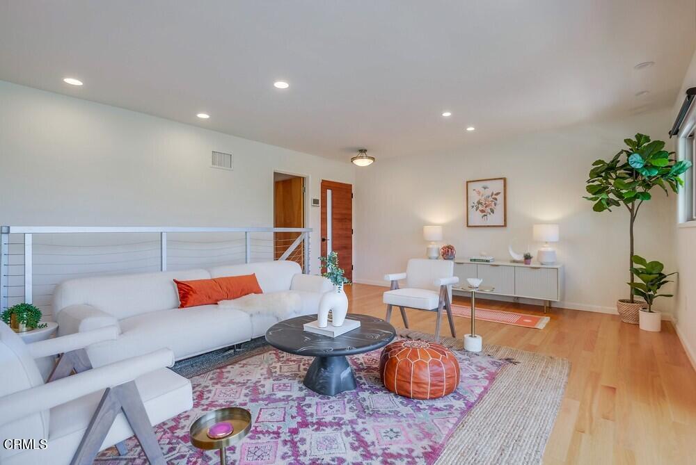 6287 Pine Crest Drive Los Angeles, CA 90042 - Photo 8 of 64 a living room with furniture and a potted plant